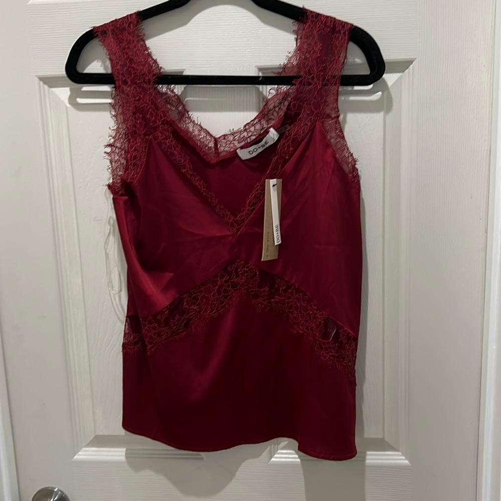 Brand new silky tank.  Size small.